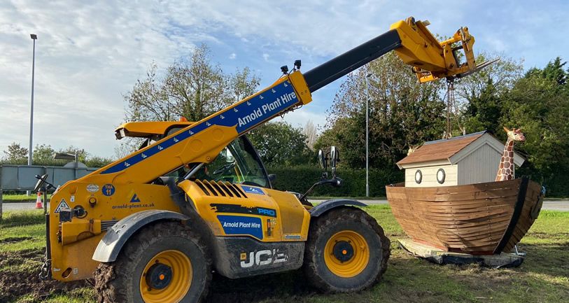 Noah's Ark being lifted into place with a forklift truck.