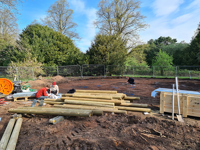 Construction workers on site at Marbury Country Park.